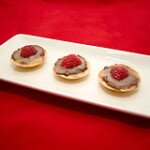 Teeny Tiny Dark Chocolate Cheesecakes with Cajeta and Raspberries