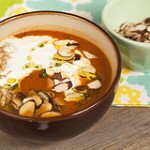 Warm Tomato Soup with Coconut Cream and Lemon-Thyme-Rosemary Oil