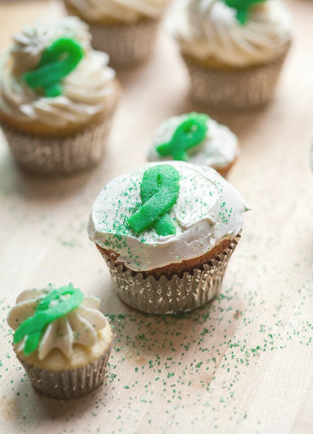 Vanilla Cupcakes with Vanilla Buttercream and Green Marzipan Ribbons | www.spachethespatula.com #recipe