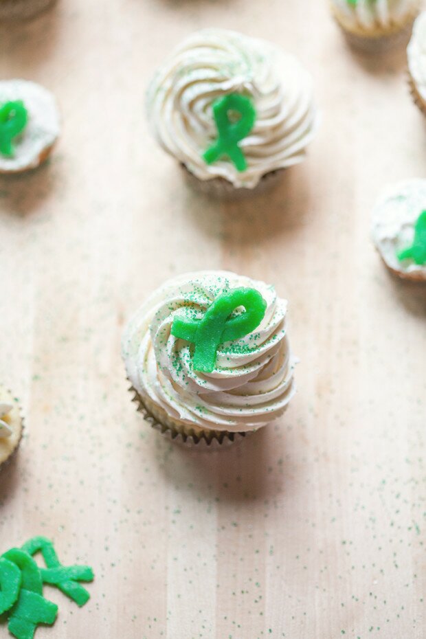 Vanilla Cupcakes with Vanilla Buttercream and Green Marzipan Ribbons | www.spachethespatula.com #recipe