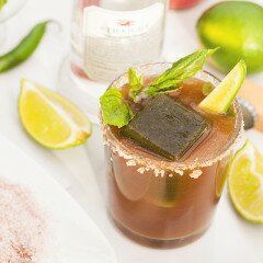 These are not your typical Bloody Marys! Spicy green ice cubes, cucumber soda, and @Hangar1Vodka make these unique! And did I mention super easy to make? | www.spachethespatula.com #recipe #Hangar1Vodka