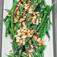 Crisp green beans are coated with a creamy, herby, whole grain mustard sauce, and topped with crunchy toasted almonds, and ready in 5 minutes! | www.spachethespatula.com #recipe