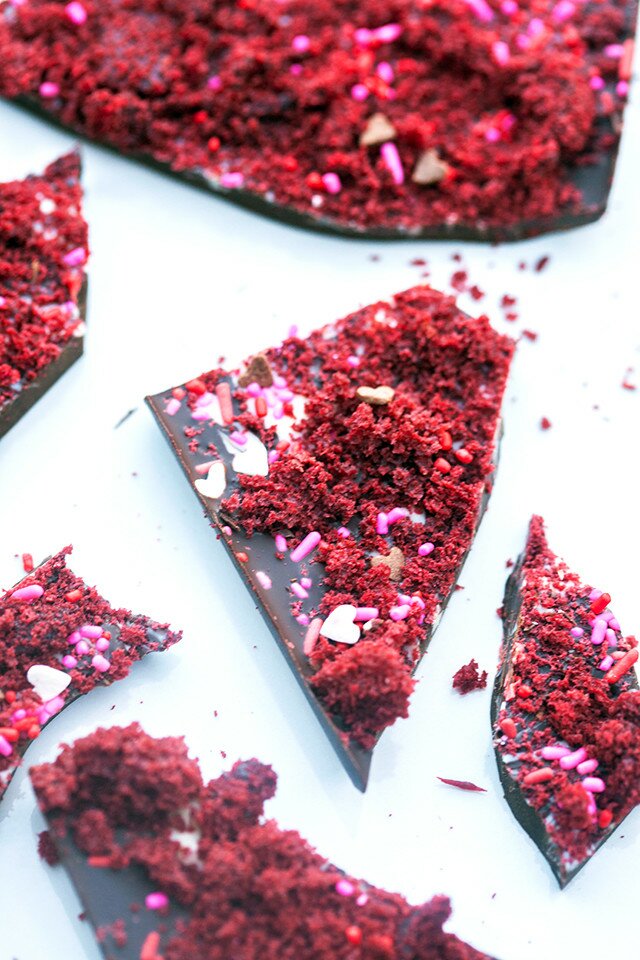 Lots of sprinkles and real red velvet cake in chocolate...what more can you really ask for?! | www.spachethespatula.com #recipe