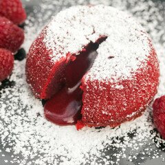 Beautiful red velvet cakes that hide a rich molten center---the most perfect Valentine's Day dessert! | www.spachethespatula.com #recipe