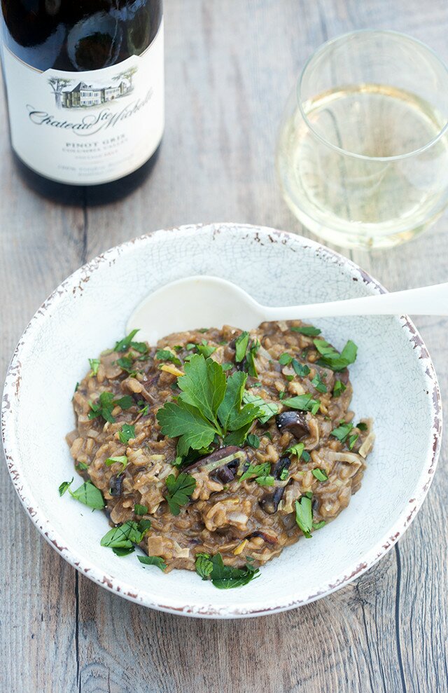 A secret ingredient packs a wallop of mushroom flavor into the creamy, decadent dish. It's the BEST mushroom risotto I've ever tried! | www.spachethespatula.com #recipe