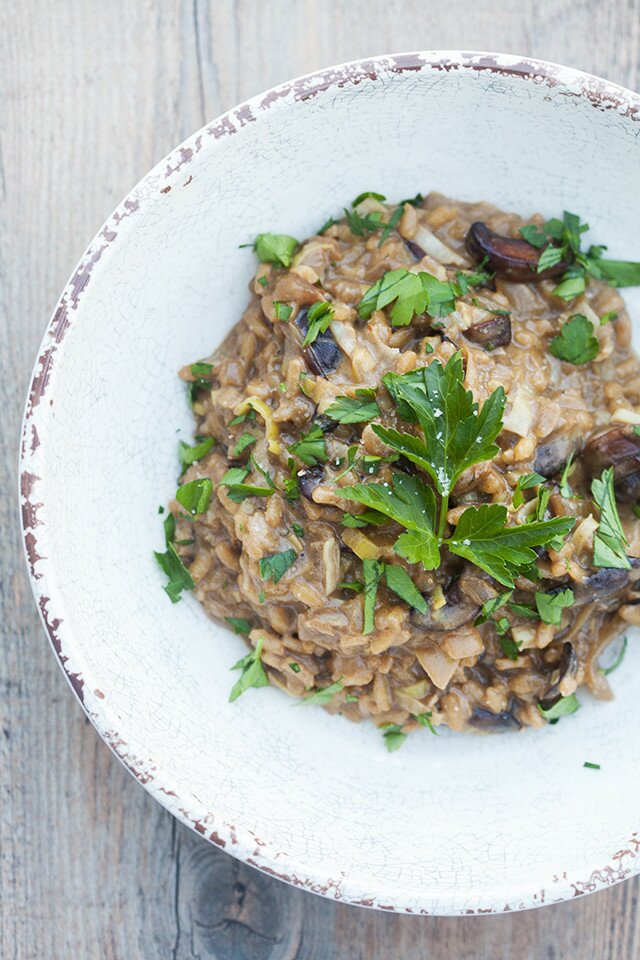 A secret ingredient packs a wallop of mushroom flavor into the creamy, decadent dish. It's the BEST mushroom risotto I've ever tried! | www.spachethespatula.com #recipe