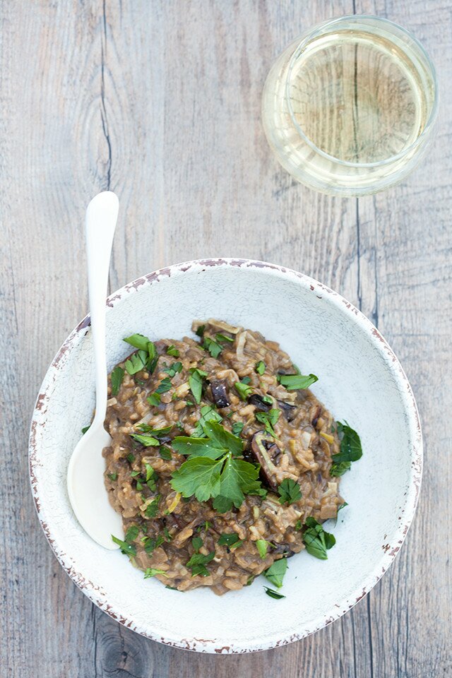 A secret ingredient packs a wallop of mushroom flavor into the creamy, decadent dish. It's the BEST mushroom risotto I've ever tried! | www.spachethespatula.com #recipe