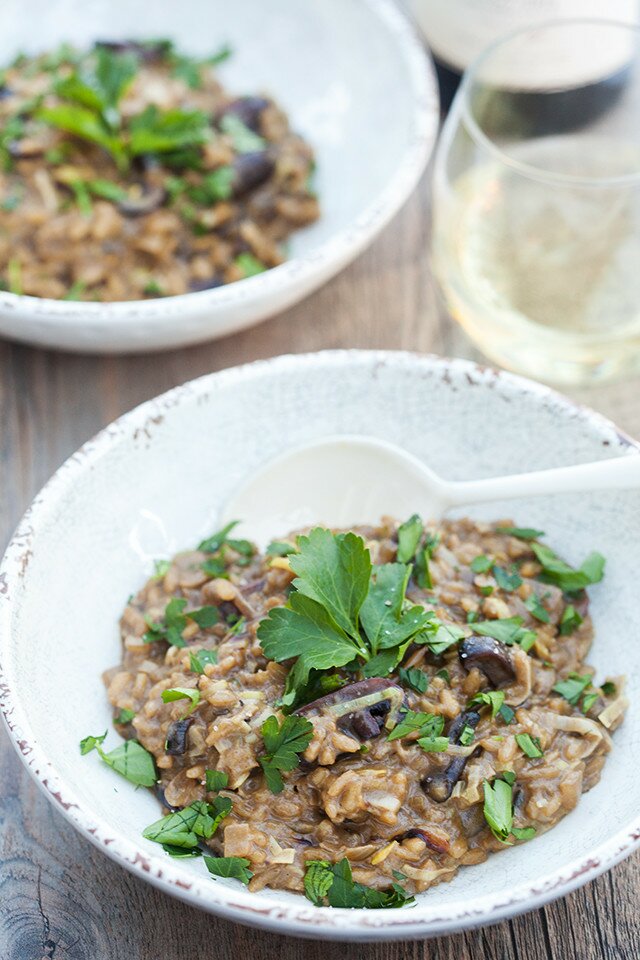 A secret ingredient packs a wallop of mushroom flavor into the creamy, decadent dish. It's the BEST mushroom risotto I've ever tried! | www.spachethespatula.com #recipe