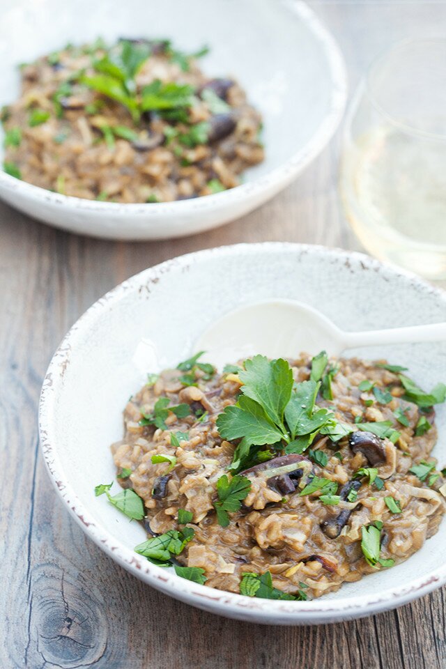 A secret ingredient packs a wallop of mushroom flavor into the creamy, decadent dish. It's the BEST mushroom risotto I've ever tried! | www.spachethespatula.com #recipe