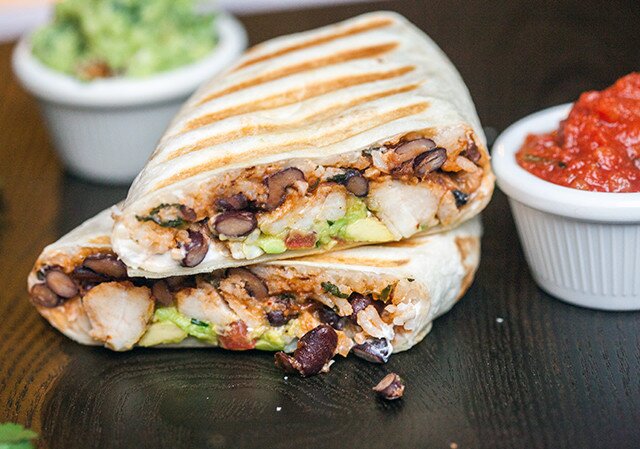 You can use any white fish in these flavorful, simple burritos, packed with cilantro-lime rice, and black beans cooked in tomato juice! | www.spachethespatula.com #recipe