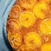 This moist and fluffy cake has a crunchy toasted cinnamon almond base, and a gooey tangelo and caramel top---it’s outrageously tasty as dessert, or breakfast! | www.spachethespatula.com #recipe