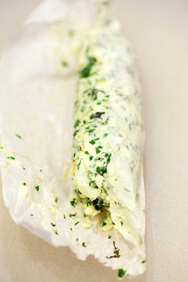 Dress up your favorite savory recipes with this fresh and vibrant compound butter using lemon and a variety of herbs! | www.spachethespatula.com #recipe