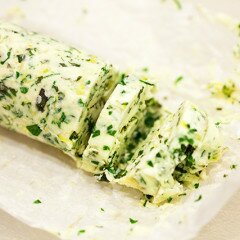 Dress up your favorite savory recipes with this fresh and vibrant compound butter using lemon and a variety of herbs! | www.spachethespatula.com #recipe