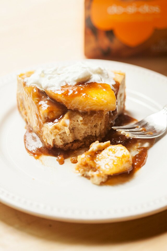 A Do-Si-Do Girl Scout cookie base, a peanut butter & banana cheesecake filling, and a bananas foster topping...it doesn't get any better than this folks! | www.spachethespatula.com #recipe