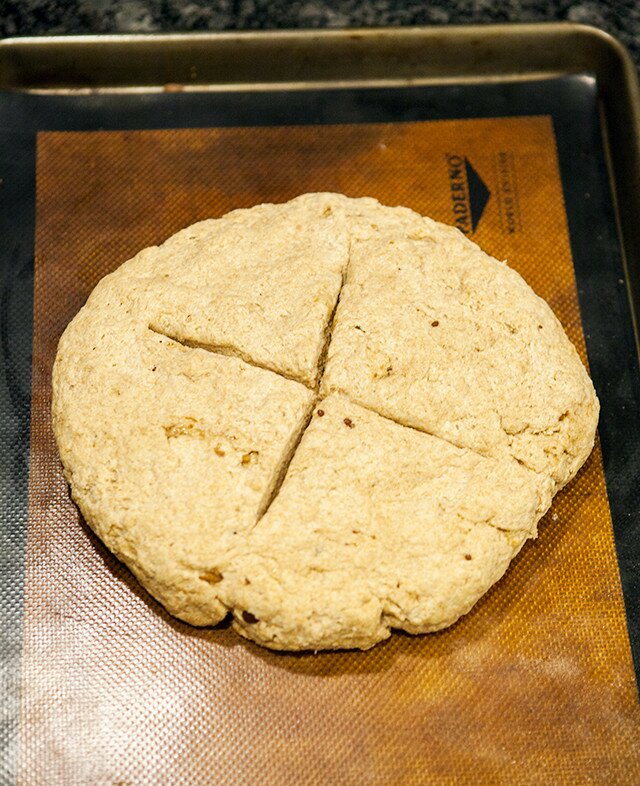 This slightly sweet, nutty, yeast-less bread has a crunchy outside and a super tender inside. Serve it with a creamy Irish butter for ultimate enjoyment! www.spachethespatula.com #recipe