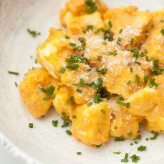 Homemade gnocchi takes just 15 minutes to make! Serve it with this outrageously tasty roasted carrot sauce for one of the best meals you'll ever taste! | www.spachethespatula.com #recipe