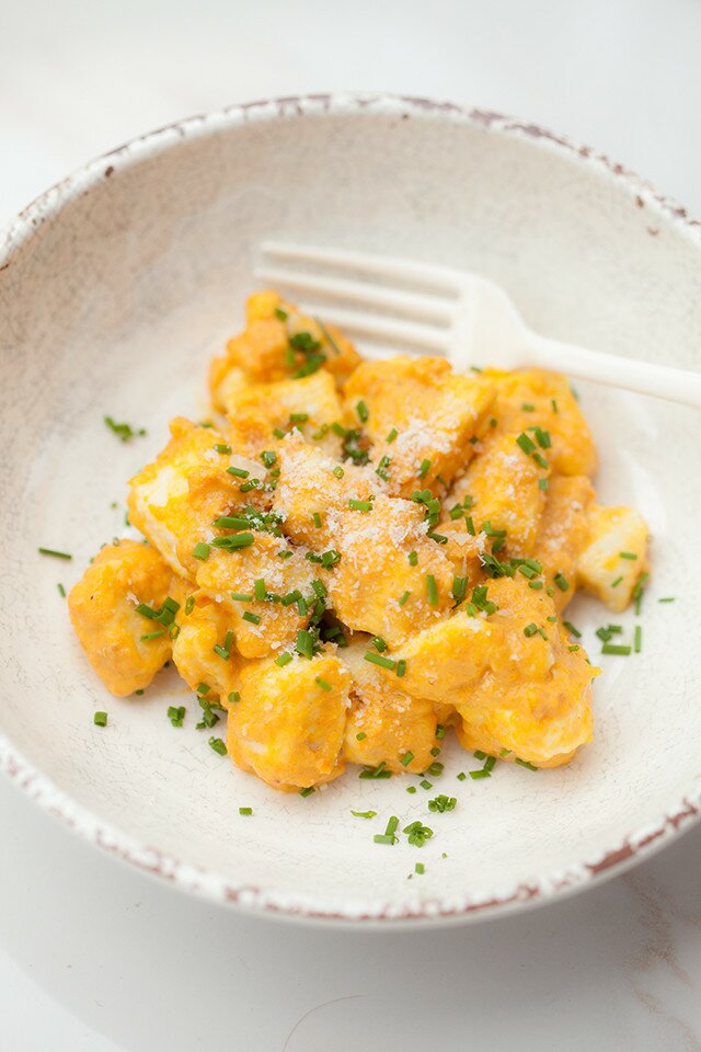 Homemade gnocchi takes just 15 minutes to make! Serve it with this outrageously tasty roasted carrot sauce for one of the best meals you'll ever taste! | www.spachethespatula.com #recipe