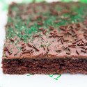 The moistest chocolate sheet cake with creamy chocolate icing, spiked with Guinness beer---this is the BEST sheet cake you will ever try! | www.spachethespatula.com #recipe