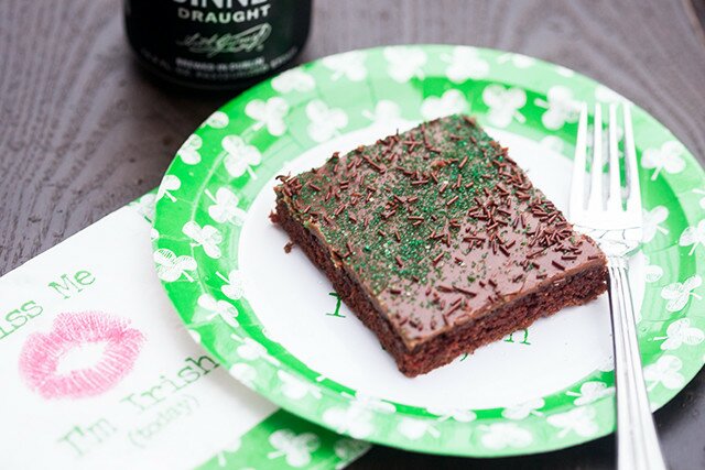 The moistest chocolate sheet cake with creamy chocolate icing, spiked with Guinness beer---this is the BEST sheet cake you will ever try! | www.spachethespatula.com #recipe