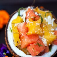 A vibrantly refreshing and tropical fruit salad full of fresh coconut! | www.spachethespatula.com #recipe