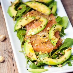 A vibrant, juicy salad with creamy avocado, peppery arugula, and unctuous pistachios oil | www.spachethespatula.com #recipe