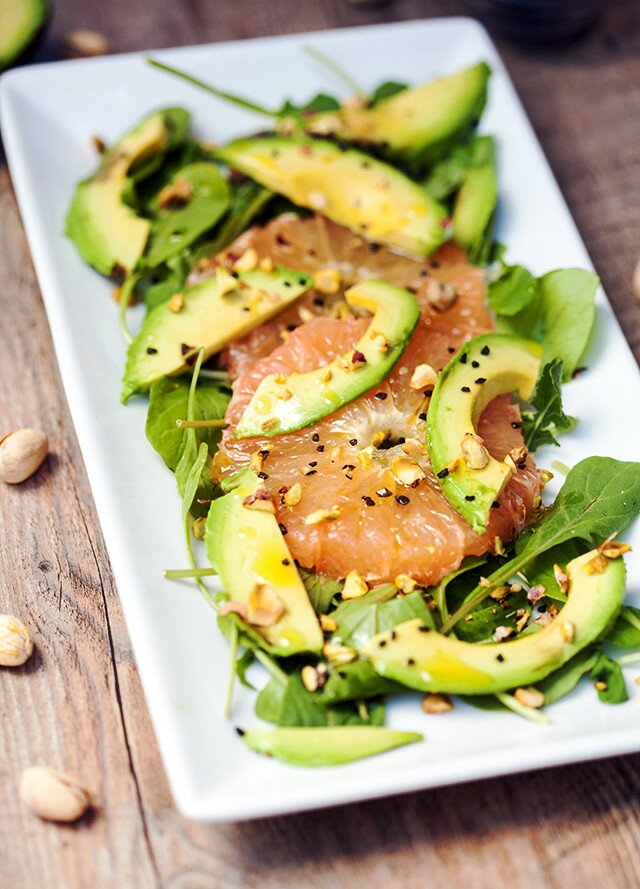 A vibrant, juicy salad with creamy avocado, peppery arugula, and unctuous pistachios oil | www.spachethespatula.com #recipe