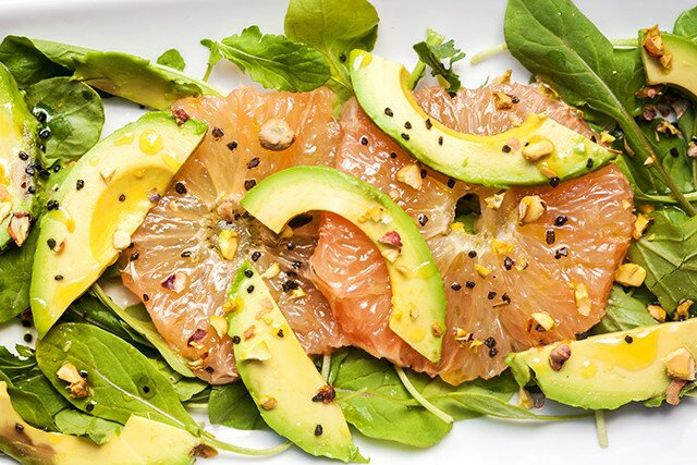 A vibrant, juicy salad with creamy avocado, peppery arugula, and unctuous pistachios oil | www.spachethespatula.com #recipe