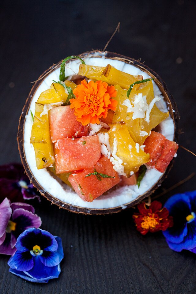 A vibrantly refreshing and tropical fruit salad full of fresh coconut! | www.spachethespatula.com #recipe