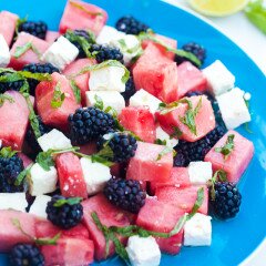 Refreshing fruit, salty feta, and tangy-sweet dressing---this is a perfect salad for warmer weather! | www.spachethespatula.com #recipe