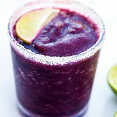 Blueberries, lime, and just a touch of agave combine for a gorgeous and delicious margarita! | www.spachethespatula.com #recipe