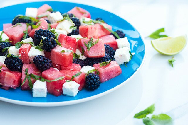 Refreshing fruit, salty feta, and tangy-sweet dressing---this is a perfect salad for warmer weather! | www.spachethespatula.com #recipe