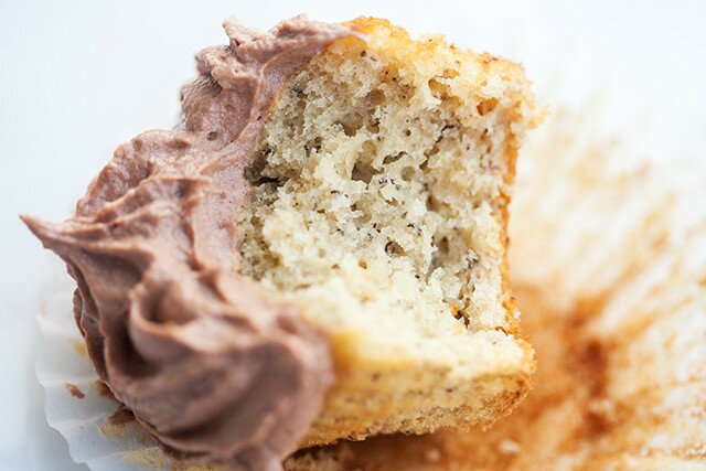 Moist and delicious banana cake topped with a soft and fluffy Nutella cream cheese buttercream---the BEST use for brown bananas! | www.spachethespatula.com #recipe