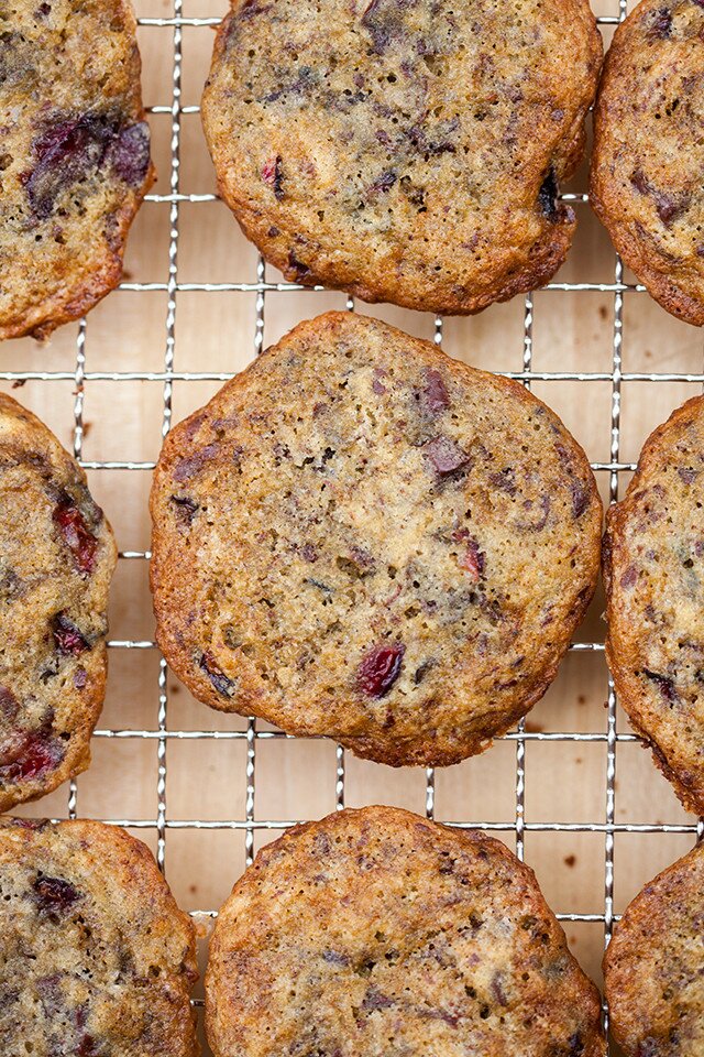 Chewy cookies filled with pieces of fresh, juicy cherries, and studded with bittersweet chocolate | www.spachethespatula.com #recipe