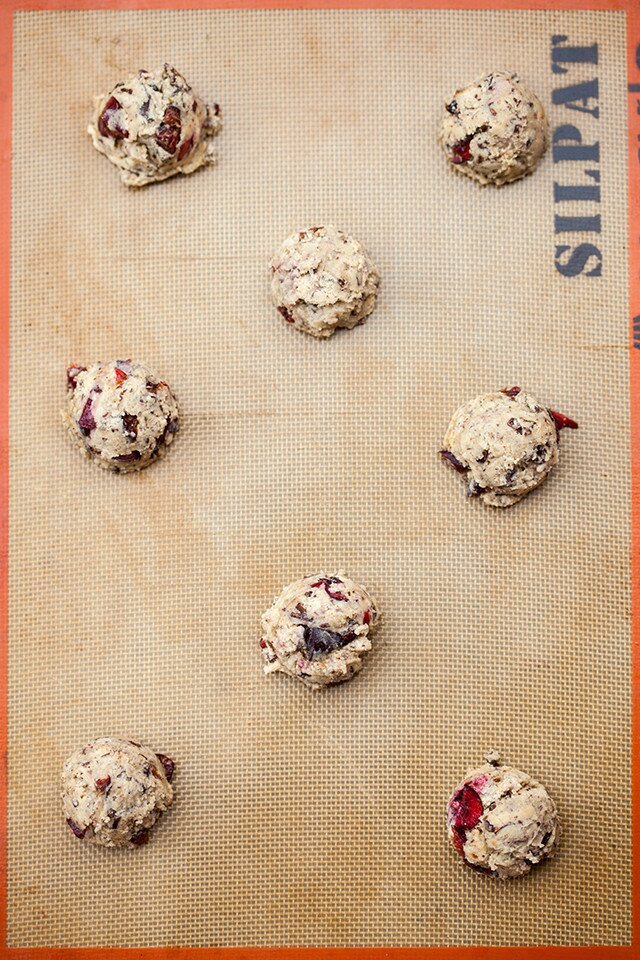 Chewy cookies filled with pieces of fresh, juicy cherries, and studded with bittersweet chocolate | www.spachethespatula.com #recipe