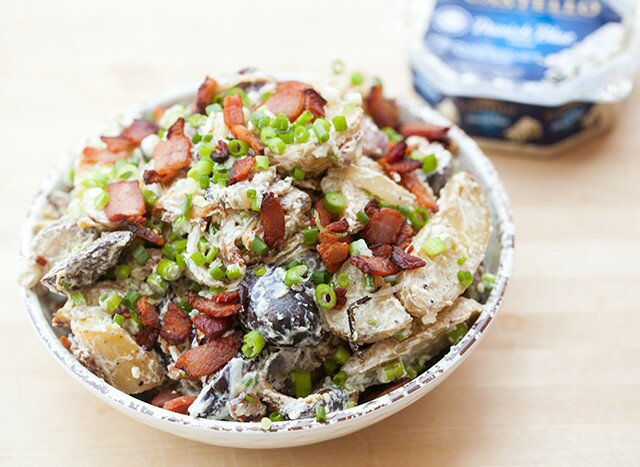 Blue cheese and sour cream make up the creamy base in this addictive potato salad! #BluesdayTuesday @castellousa| www.spachethespatula.com #recipe