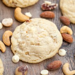 Super chewy cookies full of roasted mixed nuts and white chocolate | www.spachethespatula.com #recipe