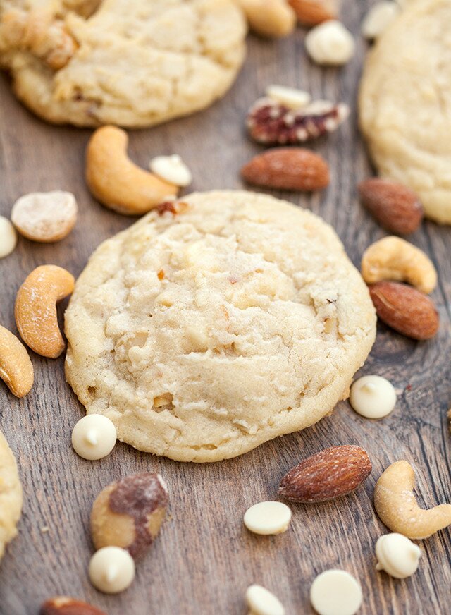 Super chewy cookies full of roasted mixed nuts and white chocolate | www.spachethespatula.com #recipe