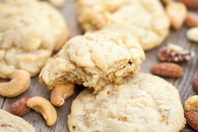 Super chewy cookies full of roasted mixed nuts and white chocolate | www.spachethespatula.com #recipe