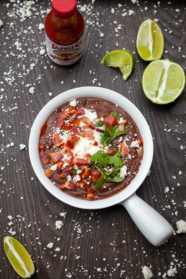 A thick and hearty black bean soup that is totally loaded with toppings! | www.spachethespatula.com #recipe