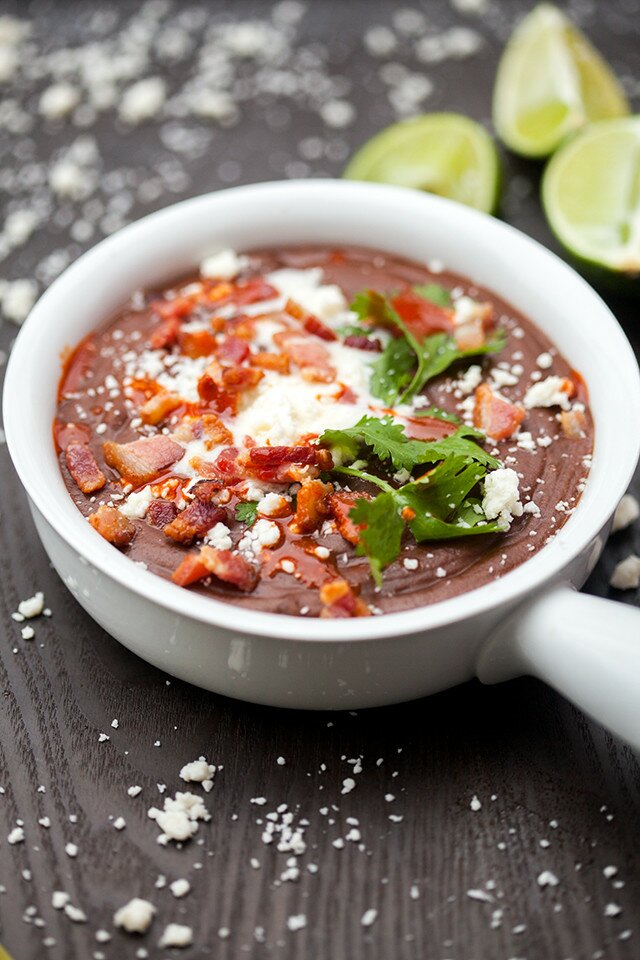 A thick and hearty black bean soup that is totally loaded with toppings! | www.spachethespatula.com #recipe