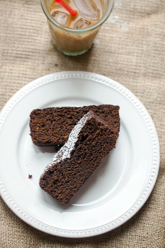 This gingerbread is sticky, moist, and full of holiday flavor...even PUMPKIN! | www.spachethespatula.com #recipe