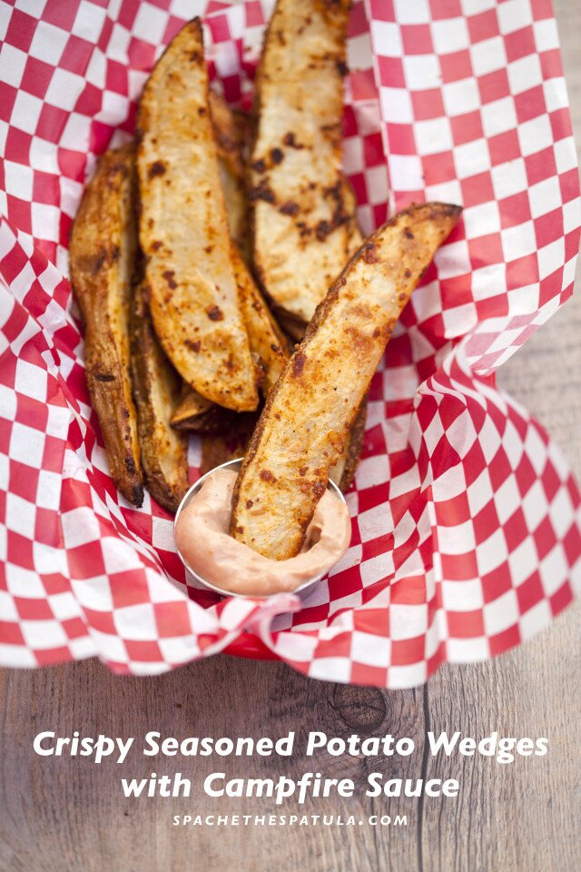 These potato wedges are crazy flavorful on their own, but even better dipped in this barbecue-y sauce! #BeholdPotatoes | www.spachethespatula.com #recipe