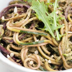 Zucchini and beet noodles tossed in a super flavorful pesto---this salad/noodle dish is so super tasty! #vegan | www.spachethespatula.com #recipe