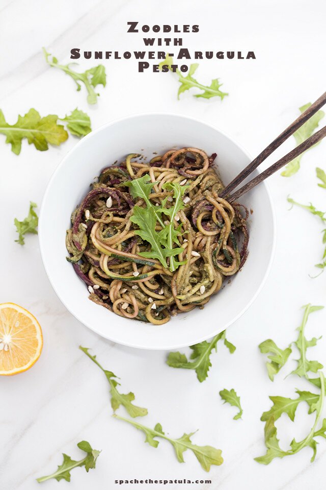 Zucchini and beet noodles tossed in a super flavorful pesto---this salad/noodle dish is so super tasty! #vegan | www.spachethespatula.com #recipe