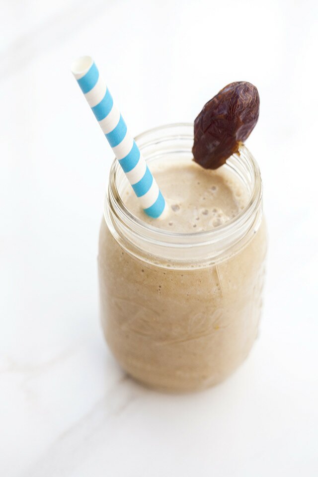 These smoothies are crazy easy to throw together, and include one of my favorite flavor combos---nutty almond butter and sticky-sweet dates | www.spachethespatula.com #vegan #recipe