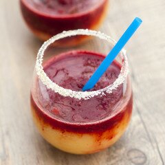 These pretty margaritas use apricots and marionberries to emulate the colors of a sunset! | www.spachethespatula.com #recipe