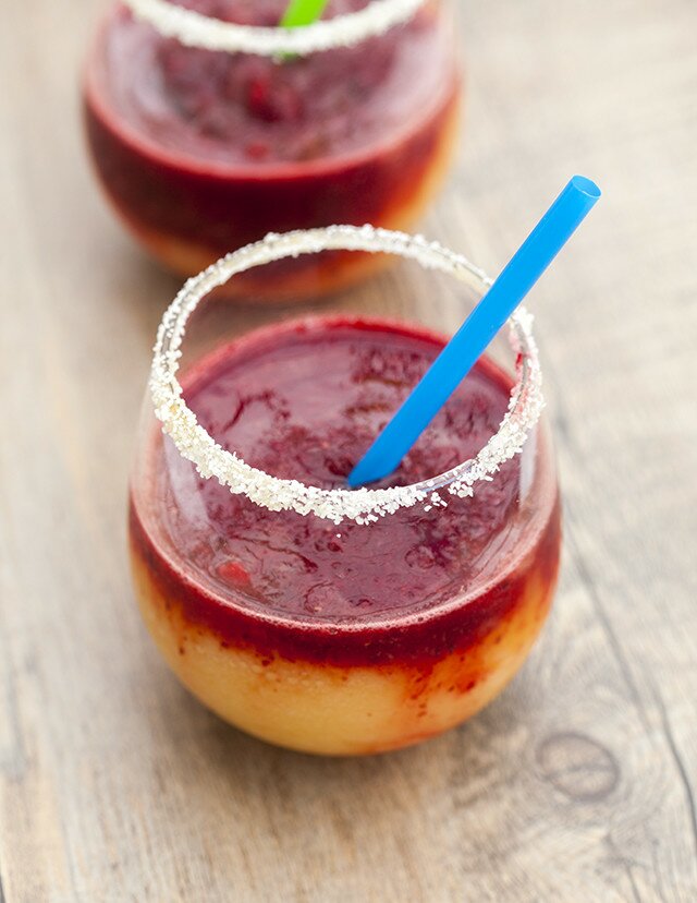 These pretty margaritas use apricots and marionberries to emulate the colors of a sunset! | www.spachethespatula.com #recipe