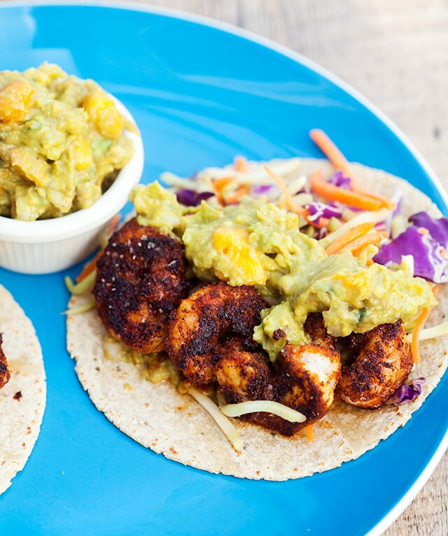 Bold and spicy shrimp pair perfectly with fruity and creamy mango guacamole! | www.spachethespatula.com #recipe