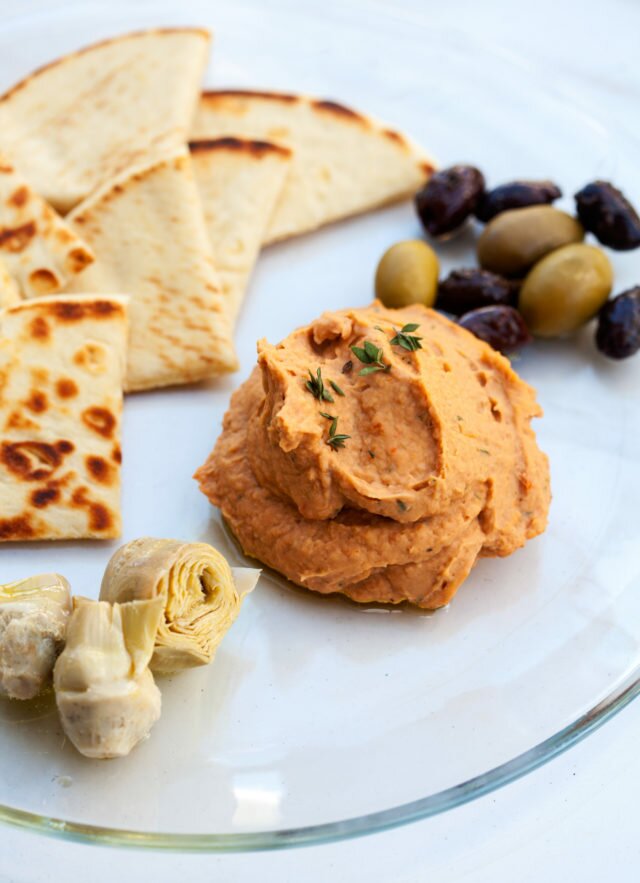 This hummus-like dip can be served warm or cold, and is packed with flavor from sun-dried tomatoes and thyme! | www.spachethespatula.com #recipe #vegan