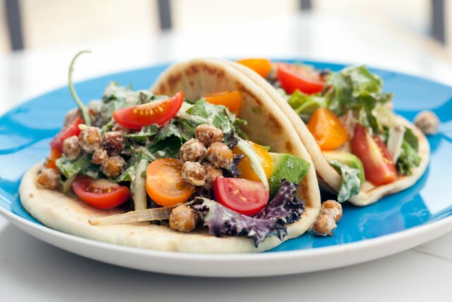 A crazy tasty #vegan caesar dressing, crunchy spiced chickpeas, creamy avocado, and sweet tomatoes make for an incredible lunch option! | www.spachethespatula.com #recipe